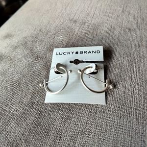 Silver hoop earrings (pierced)